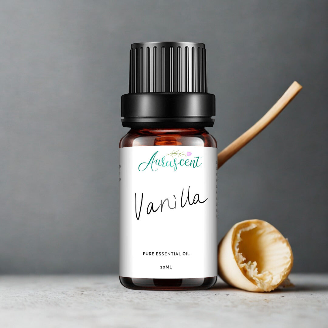 A 10ml bottle of Aurascent vanilla fragrance essential oil with a clear glass container and a white cap.