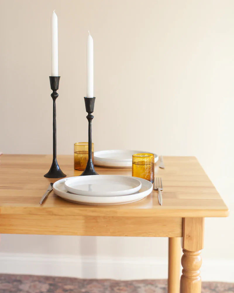 Set of two Gemini hand-forged iron candlestands with brass finish, Creative Women Australia, vintage-style candelabras.