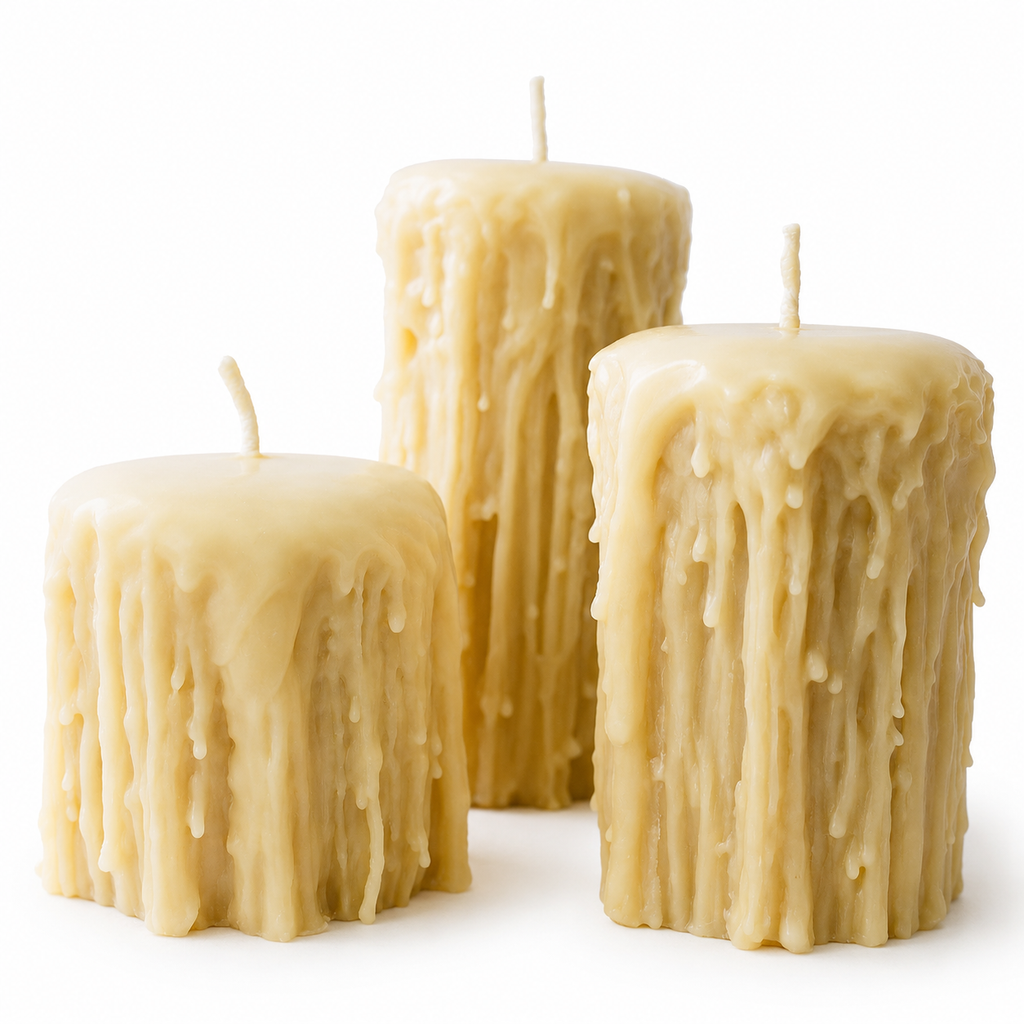 Set of three Gothic-style pure beeswax pillar candles by Serenes Beeswaxory, featuring tall, decorative candles with intricate details.