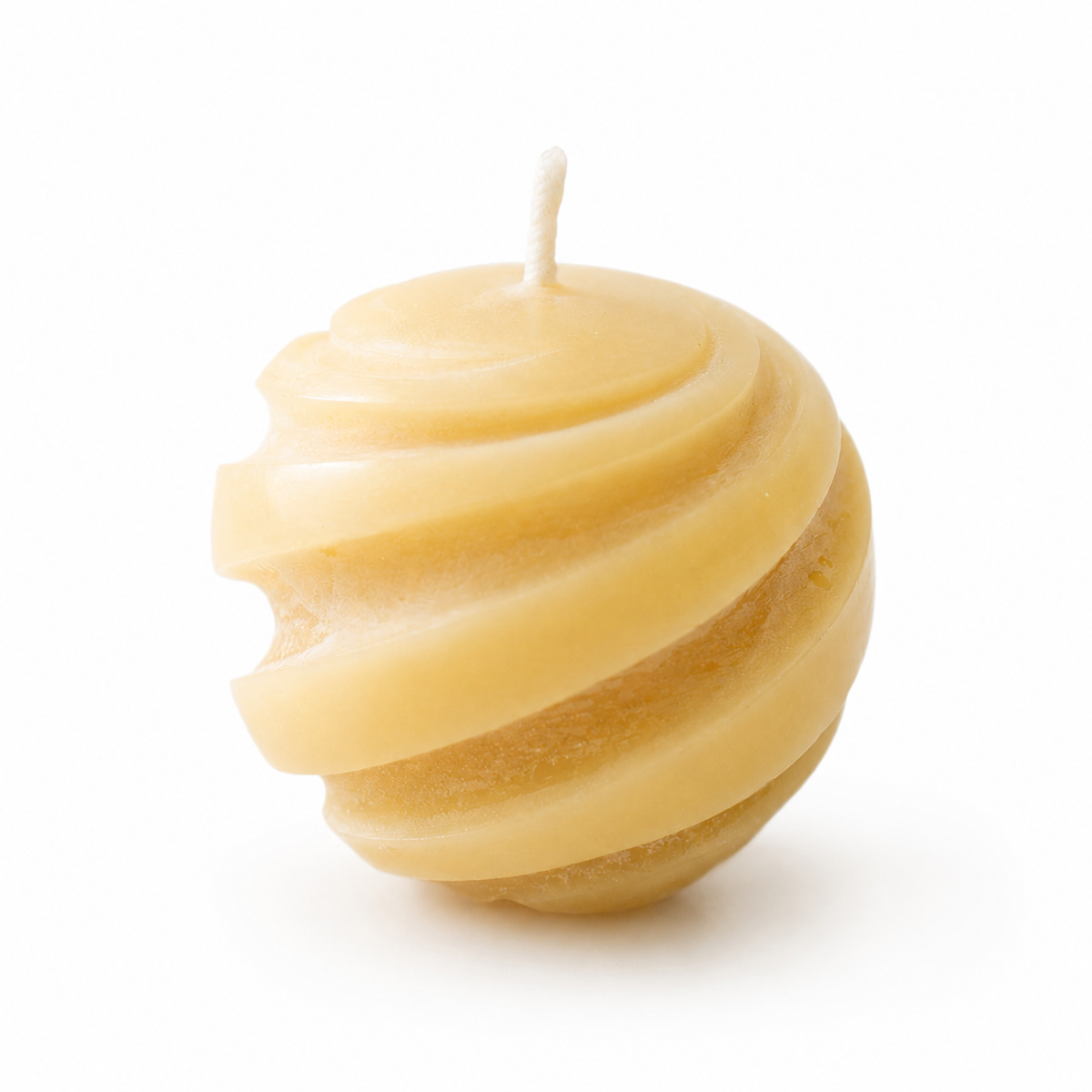 Set of three Serenes Beeswaxory swirl ball candles made of pure beeswax, displayed in a decorative box.